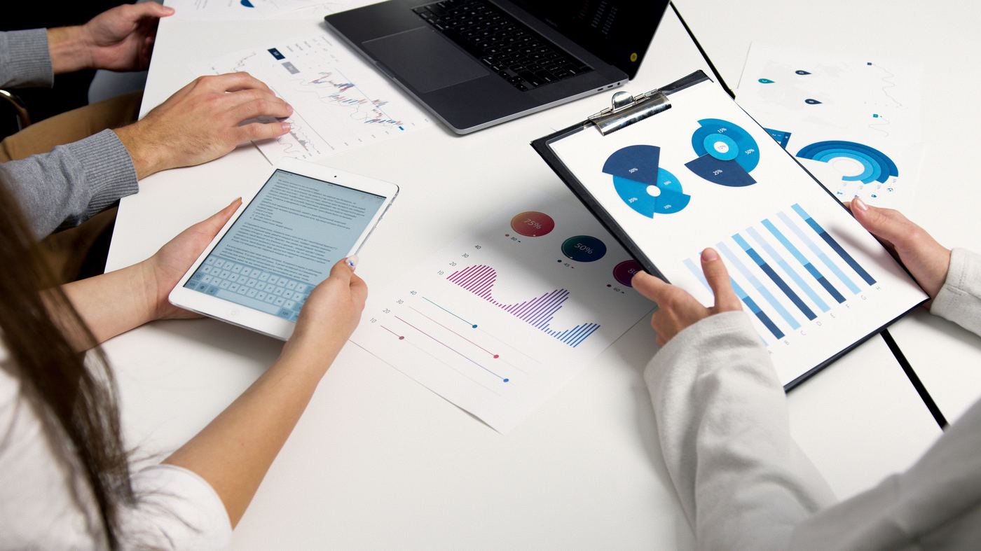 nonprofit strategy meeting with data visualization - nonprofit fundraising ROI